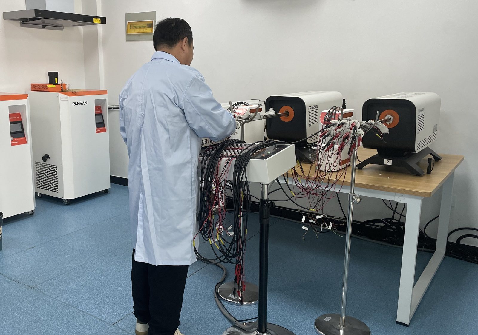 Batch of sheathed thermocouples under test on calibration furnaces before shipment